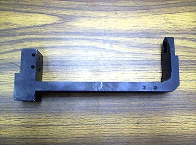 ADJUST BRIDGE CASTING-WEB 750 LOWER